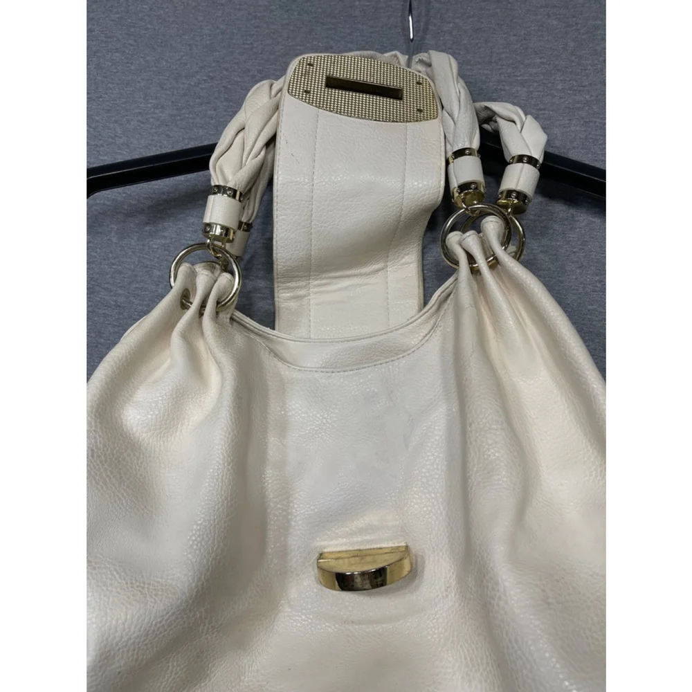 Charming Charlies cream and gold Handbag